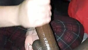 Stroking that massive black cock hard