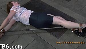 demure individuals are clamped for severe punishment in a controlled setting