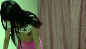 skinny japanese girl slips into tight revealing outfit