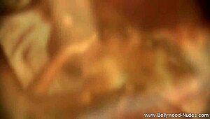 Her Bronze Skin Shines While She Teases and Strips