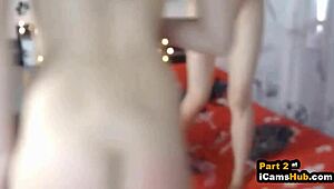 asian and white lesbians having fun with a big dildo 😏