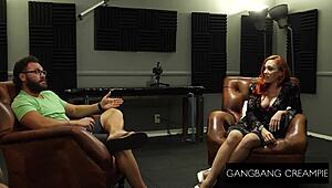 Hey, that redhead babe is diving into a wild gangbang creampie session