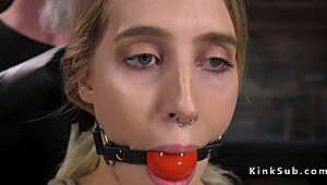 Blonde slave born to serve endures rough torment from master. Hogtied and spanked in hardcore session.