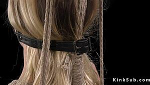 Blonde slave born to serve endures rough torment from master. Hogtied and spanked in hardcore session.