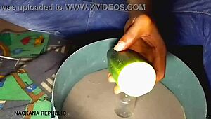 Creating a homemade pussy with a cucumber for fucking.