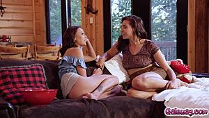 emma hix and bella rolland kissing passionately while pleasuring each other