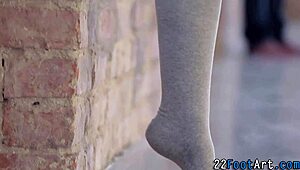 adorable babe's feet get covered in cum