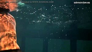 Lozhkova lounges in see-through shorts by the pool