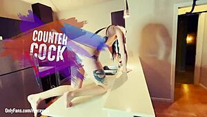 Ray ray xxx wipes down a counter before she jumps on top and fucks sucks and gives a footjob to a dildo