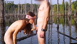 this teen couple enjoys outdoor blowjob sucking in public, ending with cumshot.