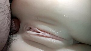 Sexual close-up of penis sliding into snow-white tight ass