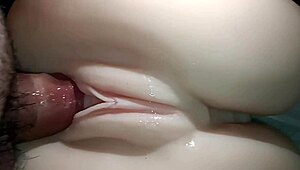 Sexual close-up of penis sliding into snow-white tight ass