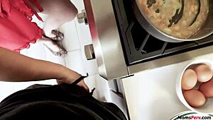 Stepmom Blows Stepson While He Cooks in Kitchen