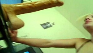 blonde deep throats huge dildo, wanna see her cum?