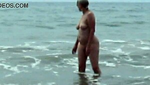 Wow, naked at textile beach, so daring! 😍