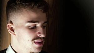A religious young man performs oral sex on a priest and then has rough intercourse with him