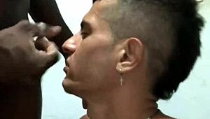 Well-Endowed Gay Guy Sucks Big Black Cock at Gloryhole