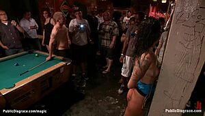 Kinky slut punished and bound in public bar whipping