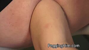 Tall busty russian mistress dominates male slave with strapon and fisting