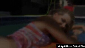 I watch Vicky Vette give a handjob until she receives a load.