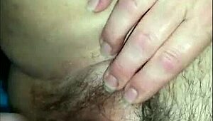 he loves teasing her hairy pussy in close-up homemade video