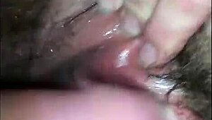 he loves teasing her hairy pussy in close-up homemade video