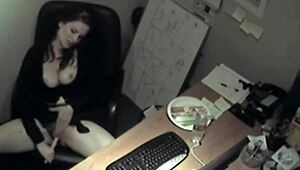 Horny secretary rubs big tits while masturbating in office hidden cam.