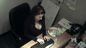 Horny secretary rubs big tits while masturbating in office hidden cam.