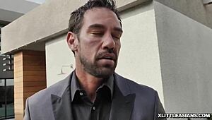 Asian teen Ella Voneva gets her pussy rammed by Diamond Banks with strap on.