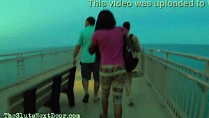 double handjob on public beach with big black cock