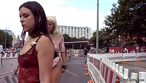 Blonde group participates in public humiliation bondage event.