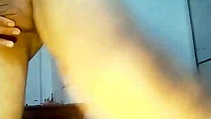 Gay guy uses anal dildo in casual sex scene at home.