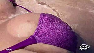 Busty Filipina wife shows off her big tits in the outdoor pool