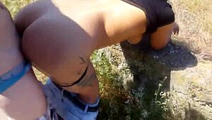 Stunning Brunette Enjoys Doggystyle Action Outdoors with Friend