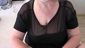 A mature housewife dildo fucks her hairy pussy, shaking fat ass on webcam.