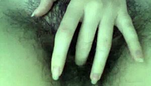 This hairy teen performs on webcam with her natural body.