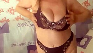 Mariaold stripping and playing with her pussy