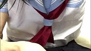 Japanese crossdresser in school uniform plays with dildo for anal fun