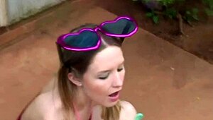 kitty karsen strips nude, playing bubbles and flashing her natural tits.