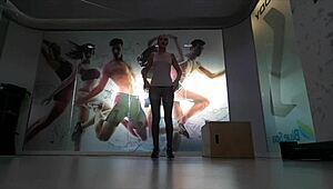 Cute blonde teen warms up at gym