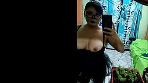 old woman looks sexy on halloween dressed as dracula showing natural tits