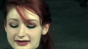 redhead submissive bound and punished hard in rough garage domination.