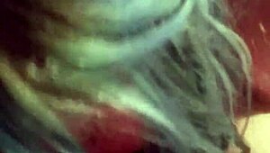 This blue-haired girl is giving me a long, intense blowjob in a casual setting