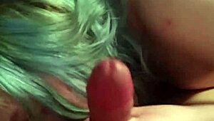 This blue-haired girl is giving me a long, intense blowjob in a casual setting