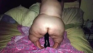 bbw feels huge pleasure riding big black dildo