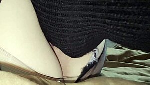 Intimate close-up of oral pleasure in torn pantyhose with nipple stimulation and climax