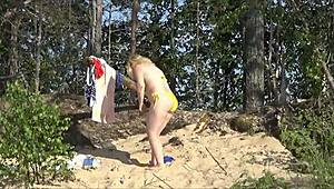 Bikini Milf Masturbates in Colorful Beach Outfit