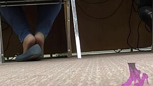 Wife teases with candid shoeplay in nude nylons at library.