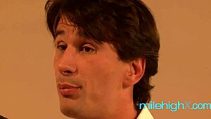 Student and teacher explore potential energy in classroom.