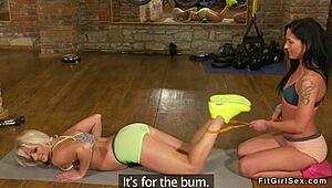 Lesbian milfs licking at the gym